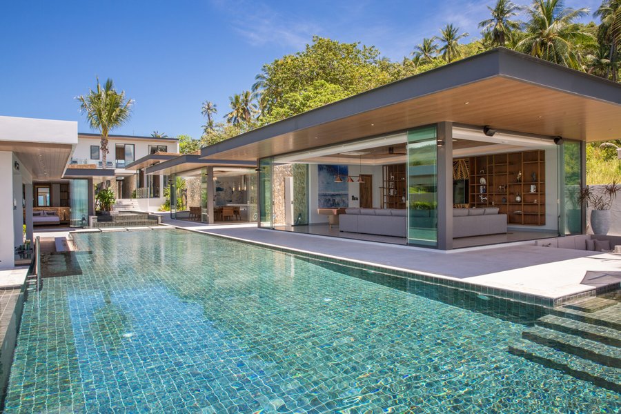 Sea Renity — pool terrace framed by tropical greenery